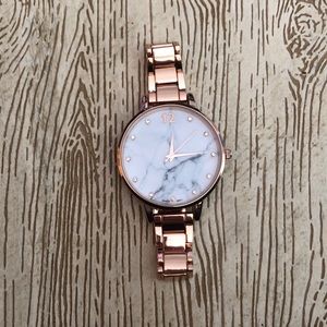 Charming Charlie’s Janssen marble dial watch
